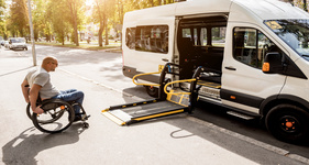 Wheelchair-accessible taxi to DIA airport in Downtown Denver, CO