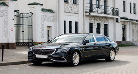 Sedan taxi to DIA airport in Downtown Denver, CO